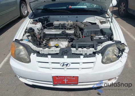 2005 Hyundai Accent Gls/Gt z USA, uszkodzony, nr VIN KMHCG35C65U350516